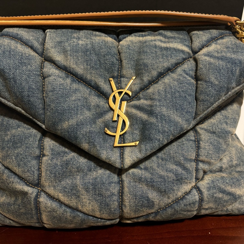 Authentic denim YSL bag with gold shoulder chain.
